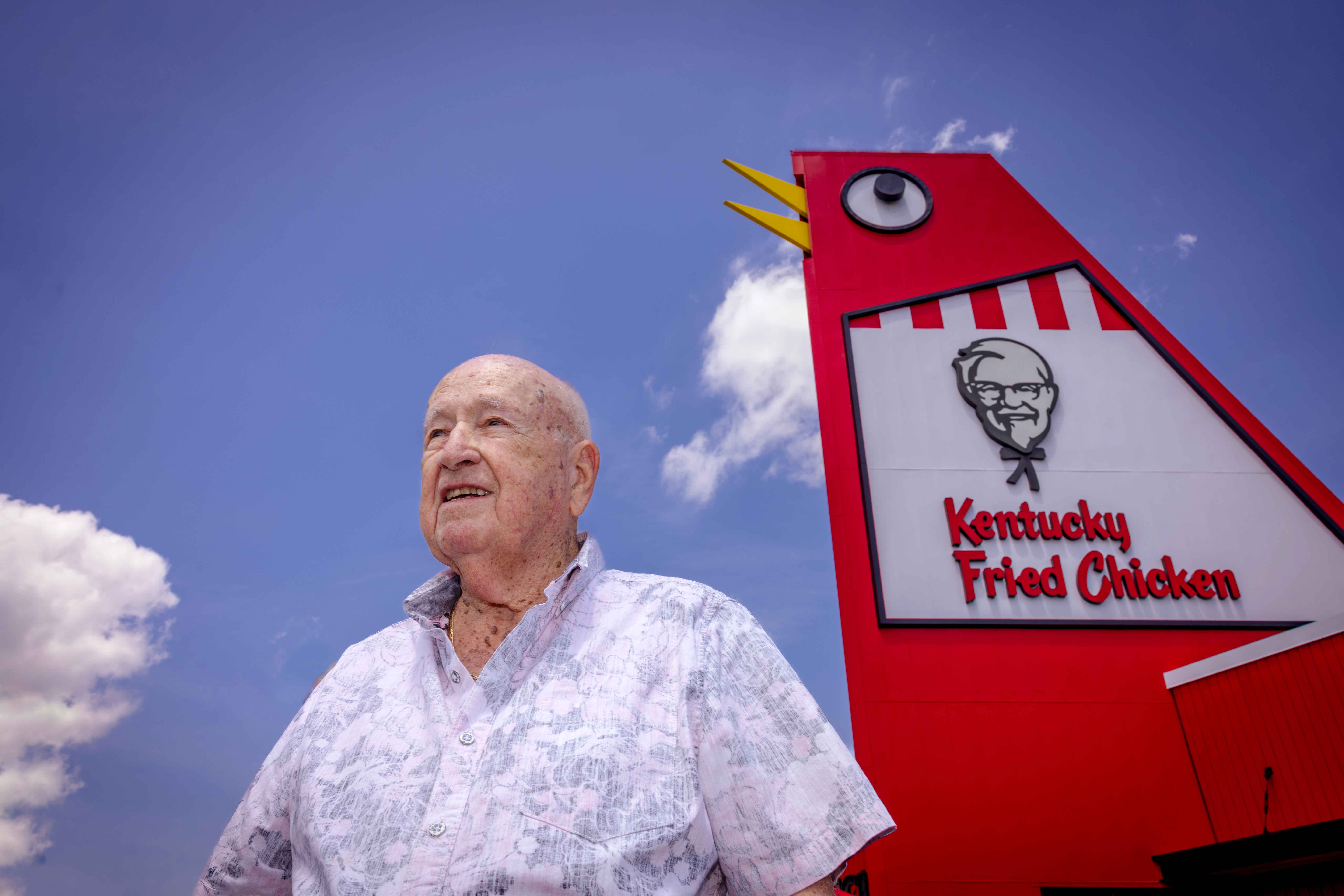Hubert Puckett in front of the Big Chicken In Marrietta